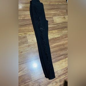 Ripped Black Jeans. From a little boutique shop. Got short on me.